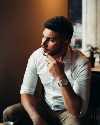 Young man thinking about hes new credit history